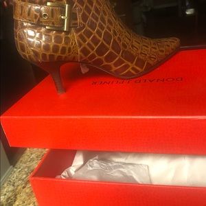 Donald Pliner croc embossed low cut booties.